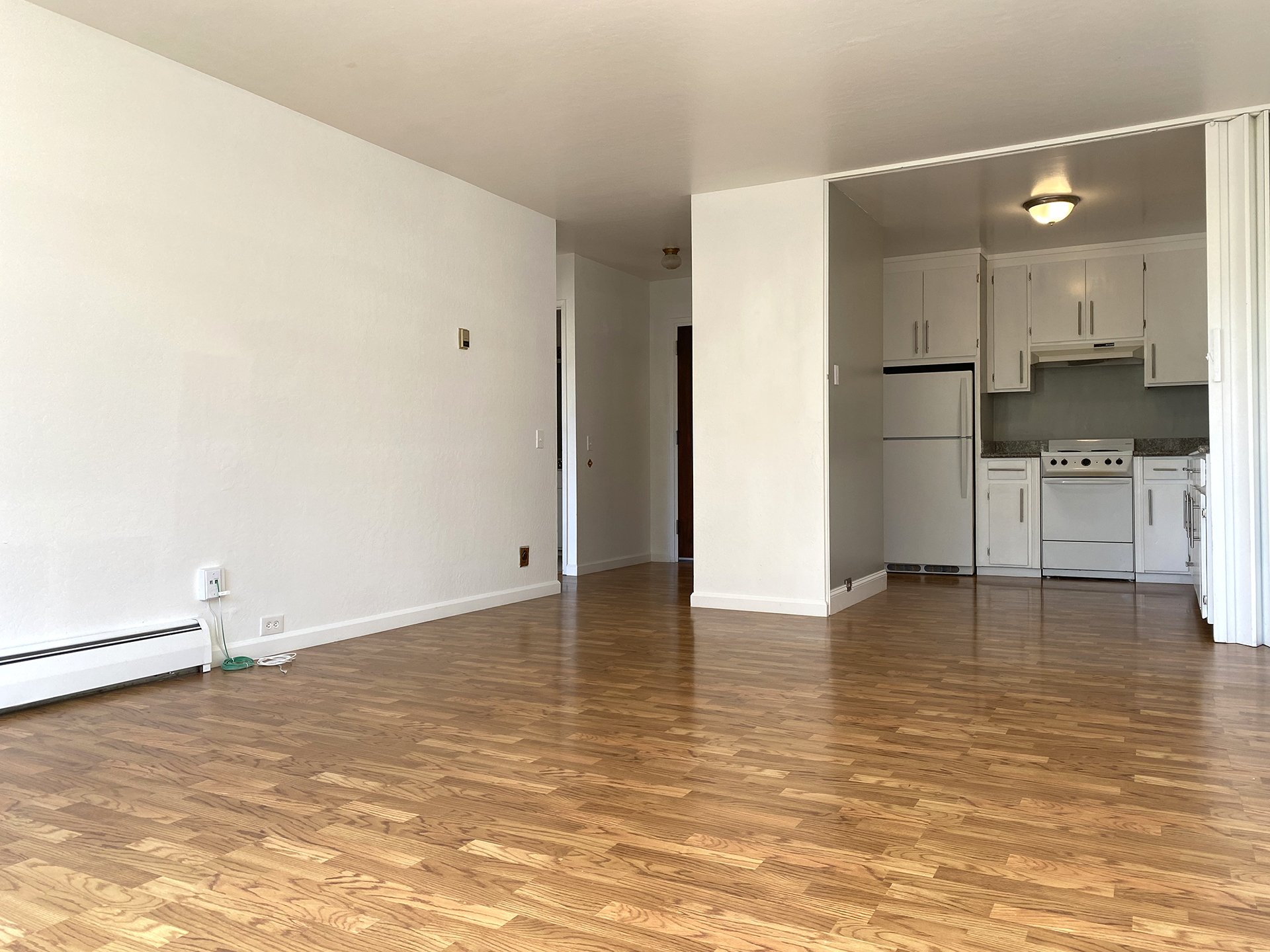 View of entrance, kitchen, & living room