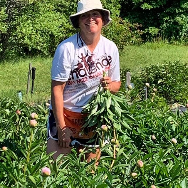 Our pickers are joyous when picking our peonies, as you can see. Our new addition to the crew, Annette, is out of this world!