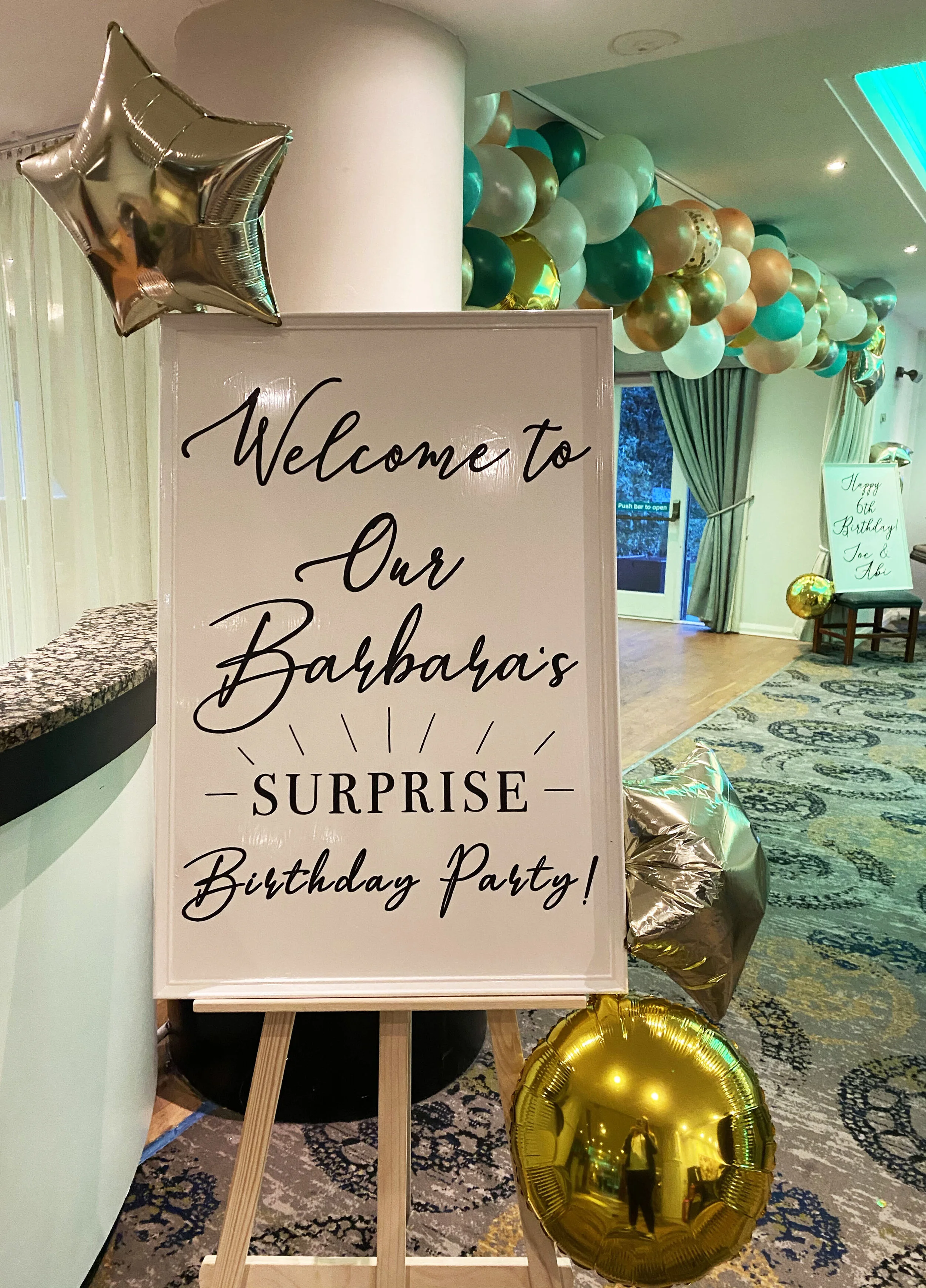 Hand painted surprise birthday sign