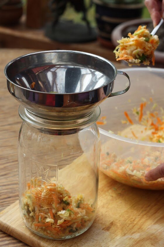 Kimchi 6 putting in glass jar to ferment.jpg