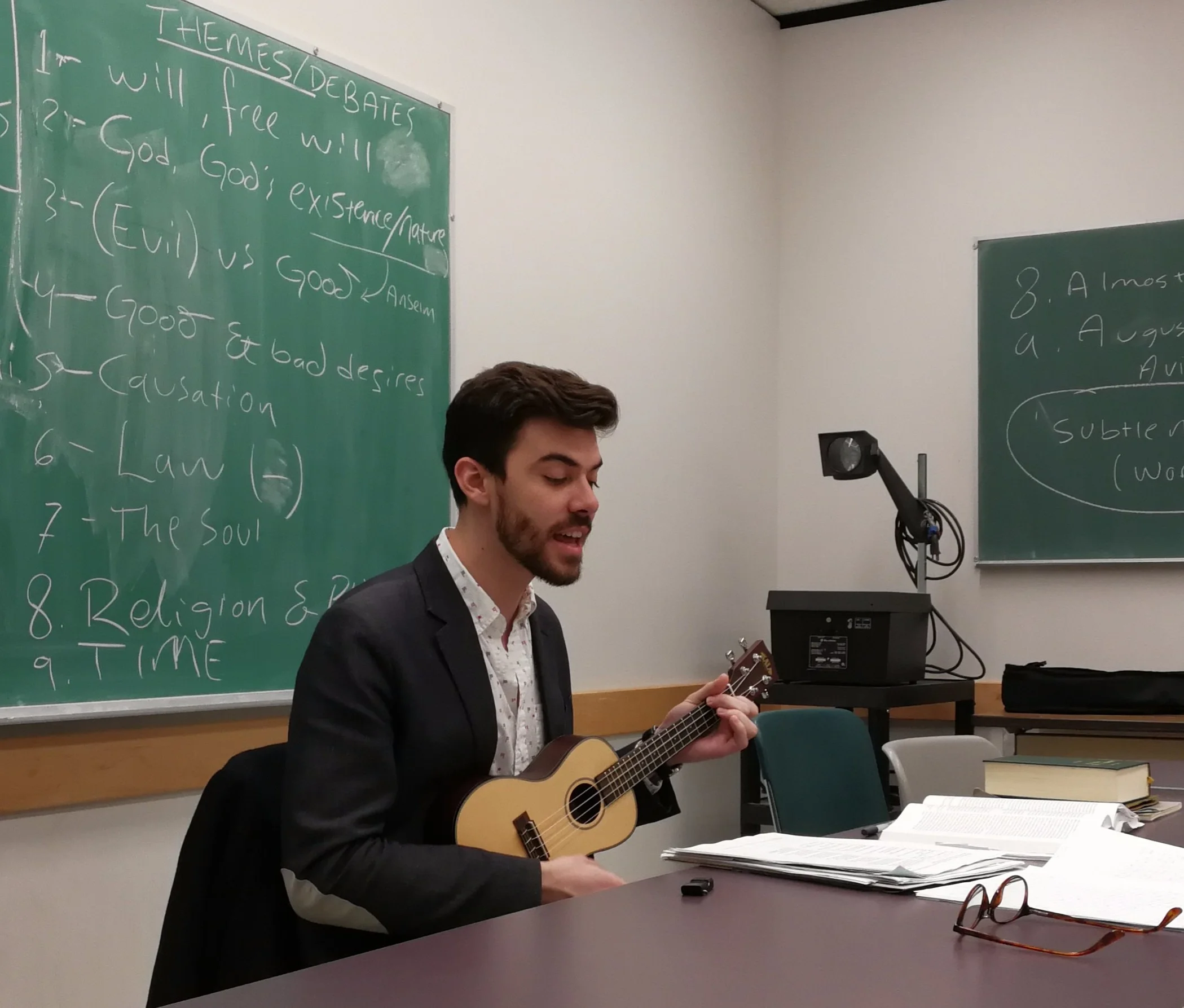 Singing a song I wrote to help my students study: “Early Medieval Philosophy (For Course of Same Name)” . Here are the lyrics (—link opens in a new tab).