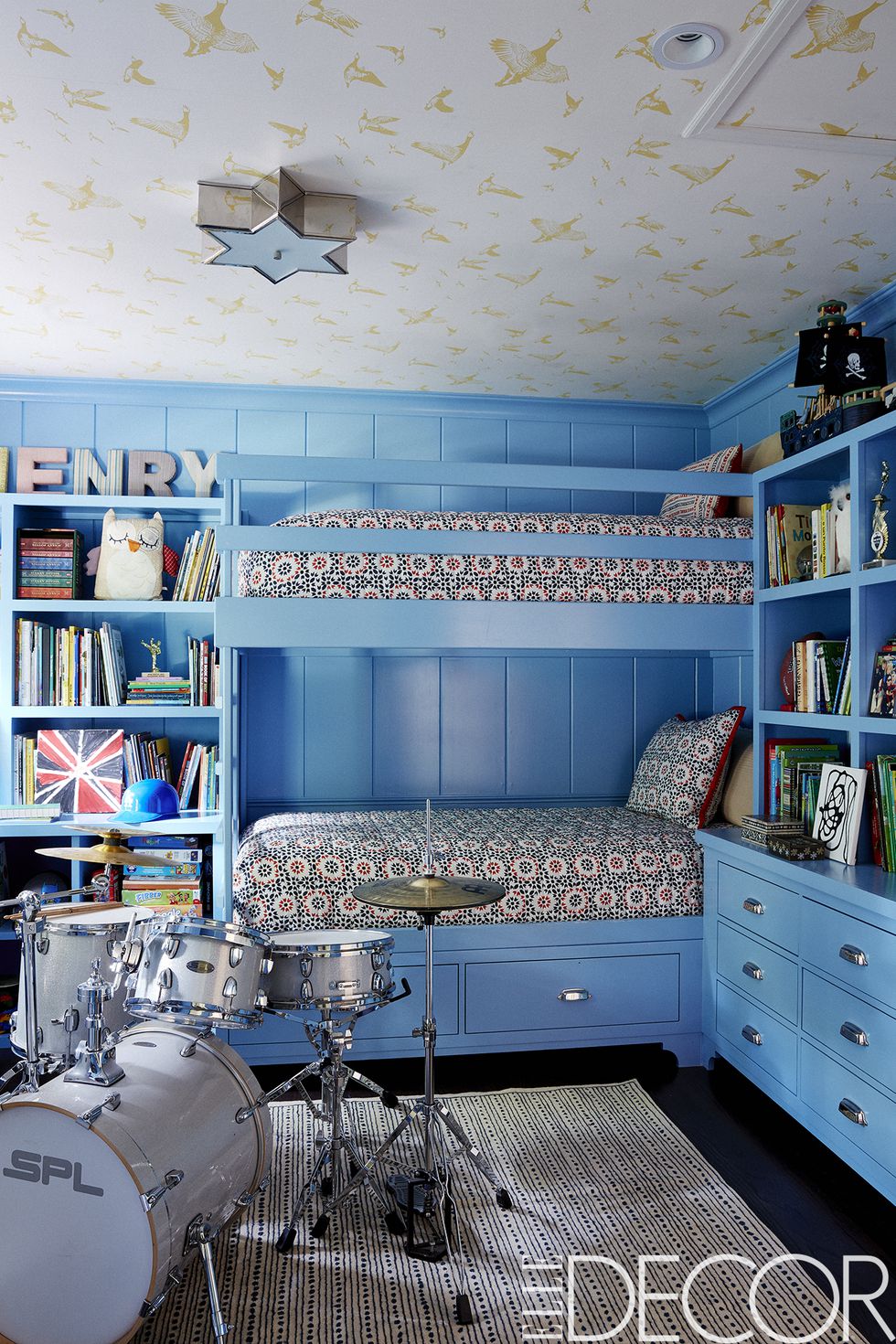 In Driver’s son’s bedroom, the bunk beds and cabinetry are painted in Benjamin Moore’s Poolside and the bedding is from Driver’s home collection for HSN .