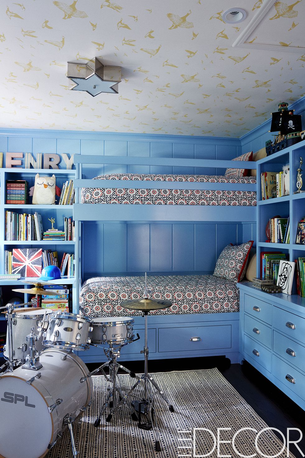 In Driver’s son’s bedroom, the bunk beds and cabinetry are painted in    Benjamin Moore’s Poolside    and the bedding is from    Driver’s home collection for HSN   .