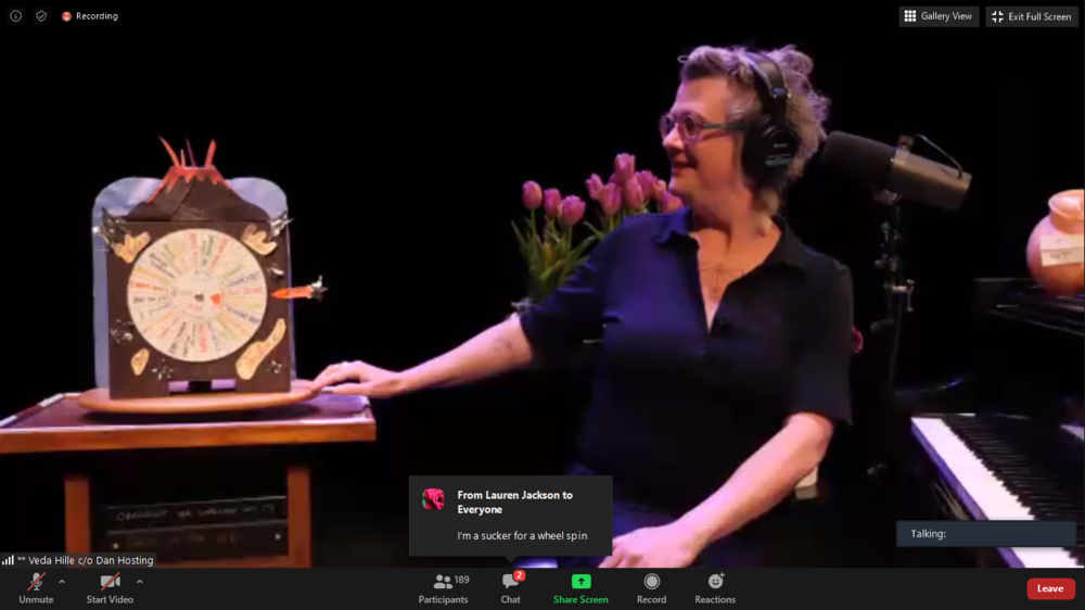 Veda Hille brining in props while live streaming from the Cultch.