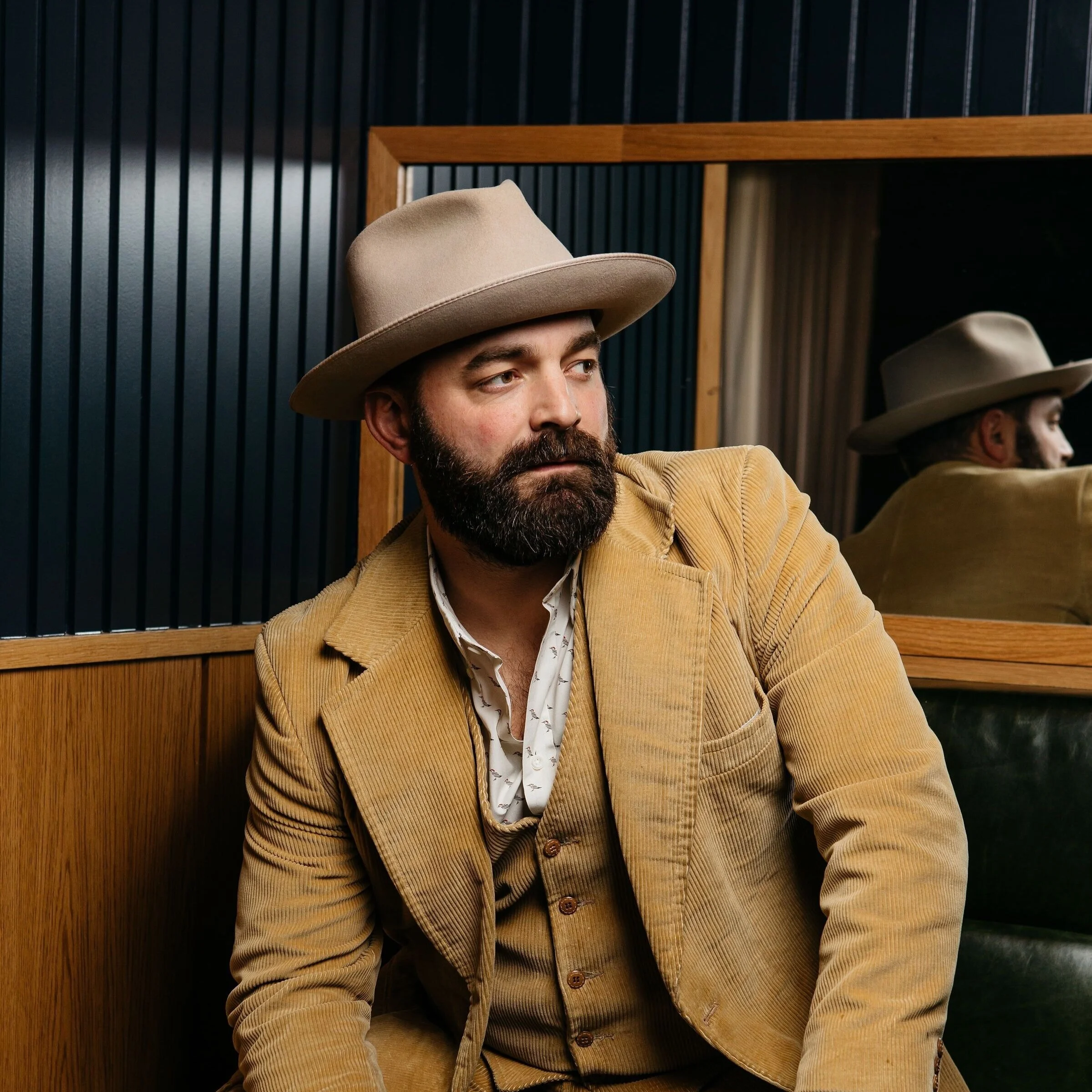 "Who is Drew Holcomb?"