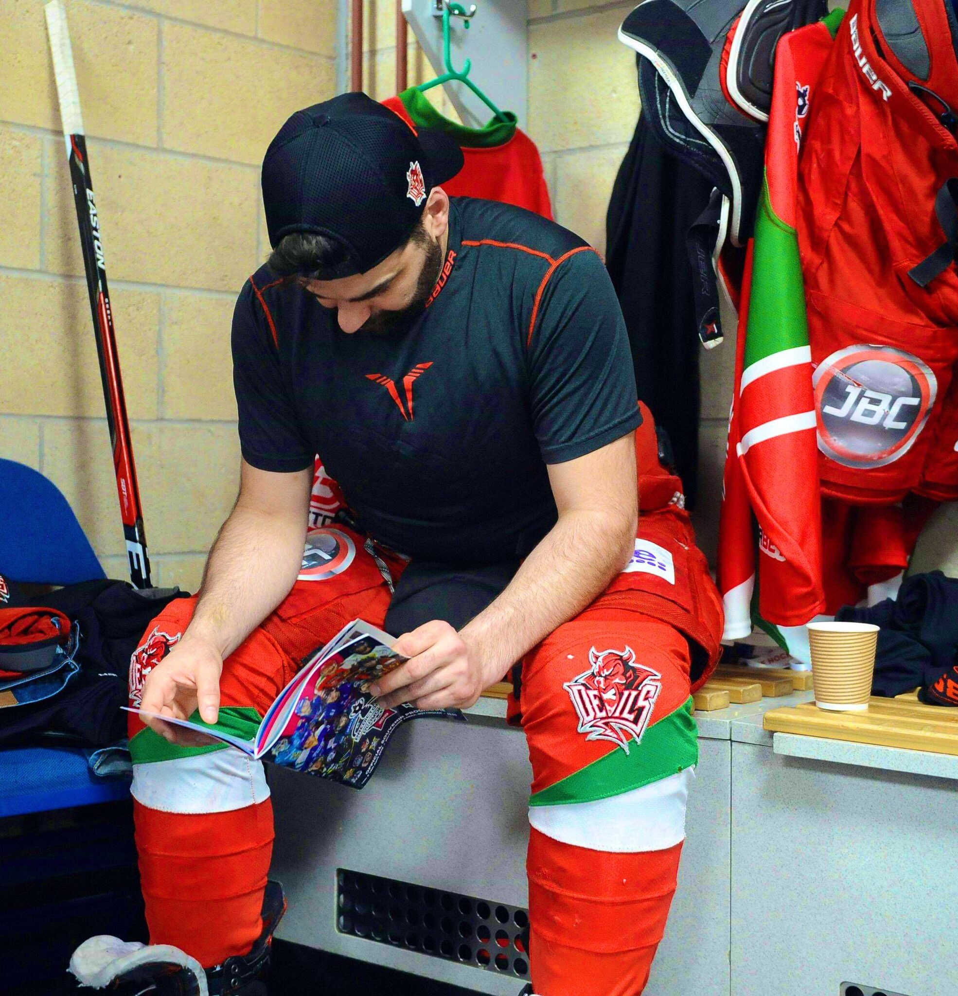 Cardiff Devils’ Sean Bentivoglio reading my programme pre-game