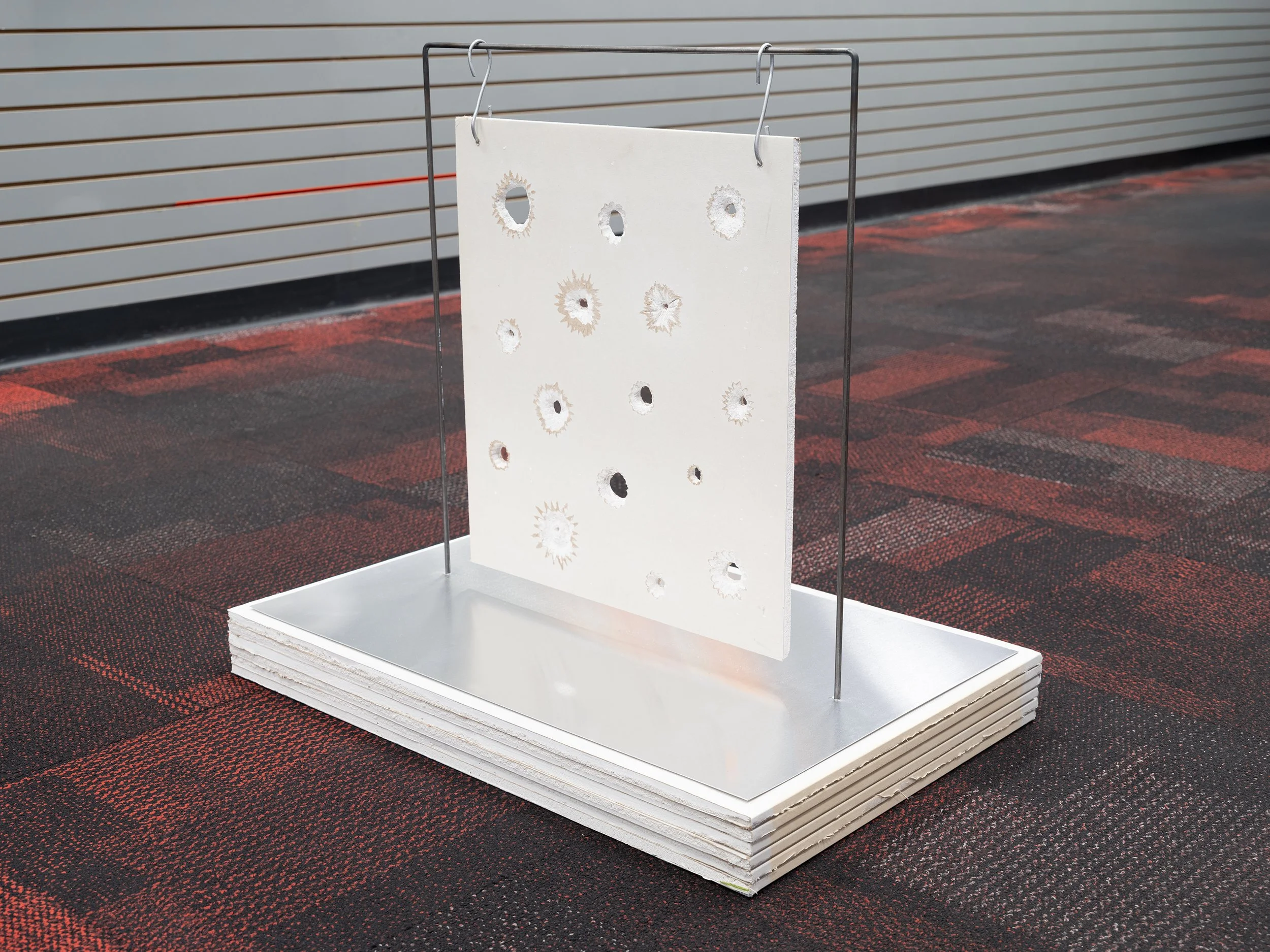  a collection of flowers and holes, 2026  drywall, aluminum, steel  Installation view at   PHARMAKON,  The Mall Upstate, Kingston , NY  