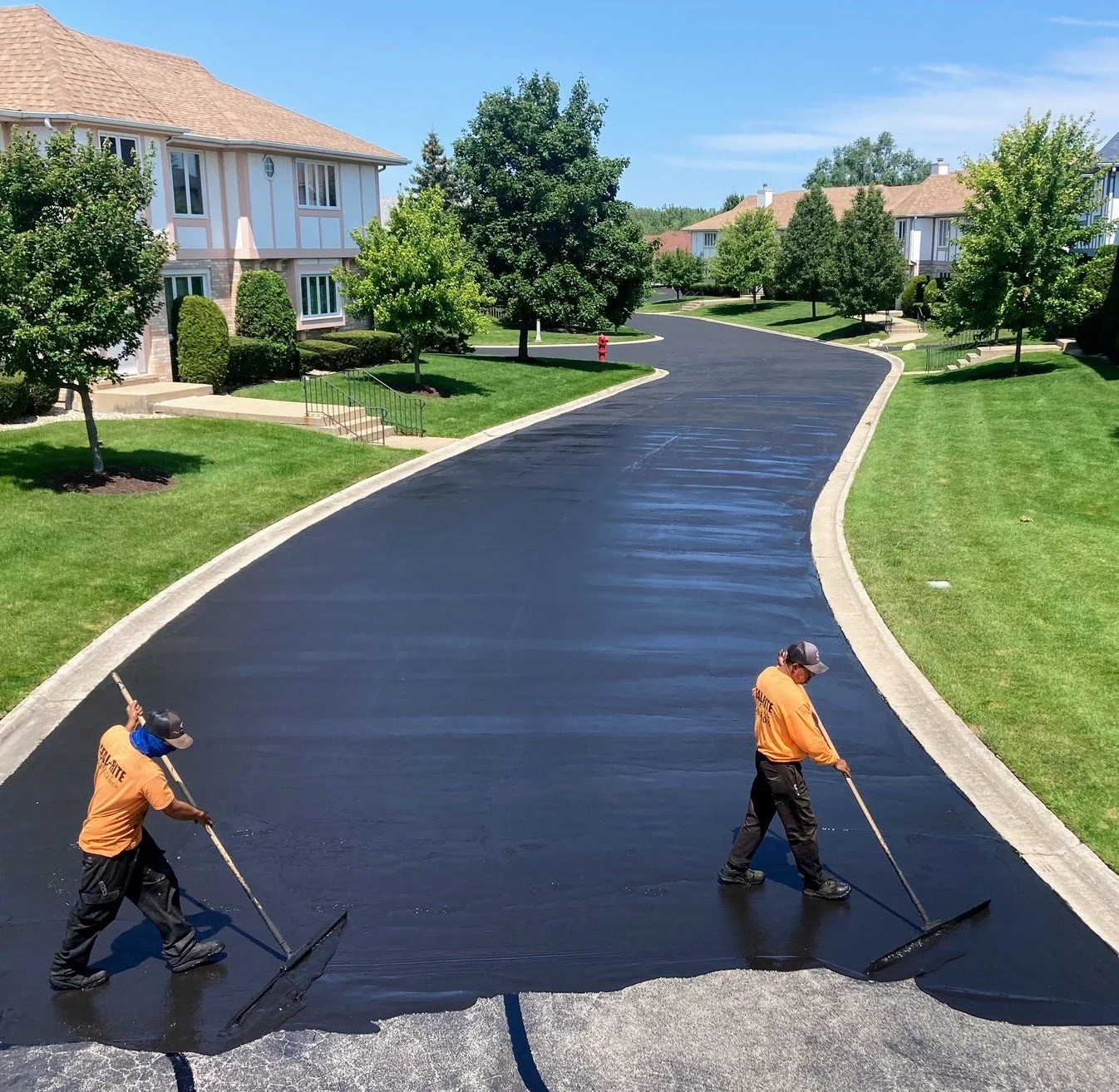 Premium Driveway and Parking Lot Sealcoating Service