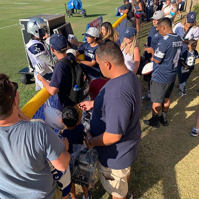 Nadia getting all of the autographs.