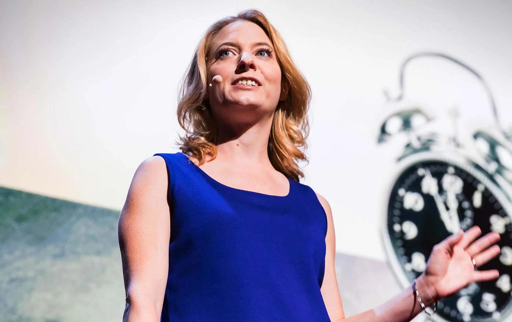 Vanderkam on the TED stage. PHOTO CREDIT: MARLA AUFMUTH/ TED