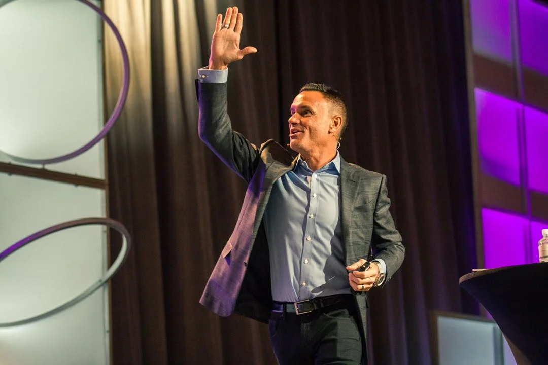 Harrington delivering a keynote speech. PHOTO COURTESY OF XPONENTIAL INC.