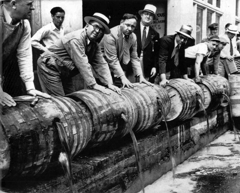 Wine being dumped during the enactment of prohibition in 1920; Photo Credit: Javier Sanz 