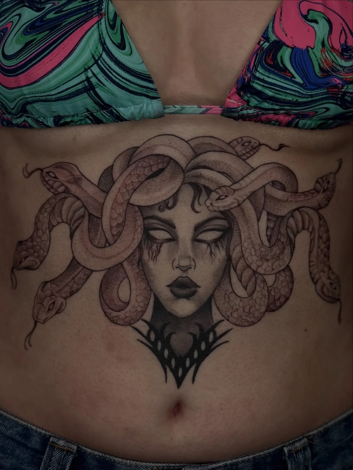 Super stoked to have finished this Medusa for Ruby! @viatrix.x._  𓆘  Half fresh, half healed! Ruby has gotten her thigh, back &amp; now stomach done by me 🥹 

Thanks so much for making the travel &amp; trusting me with another piece💓

appreciate Y