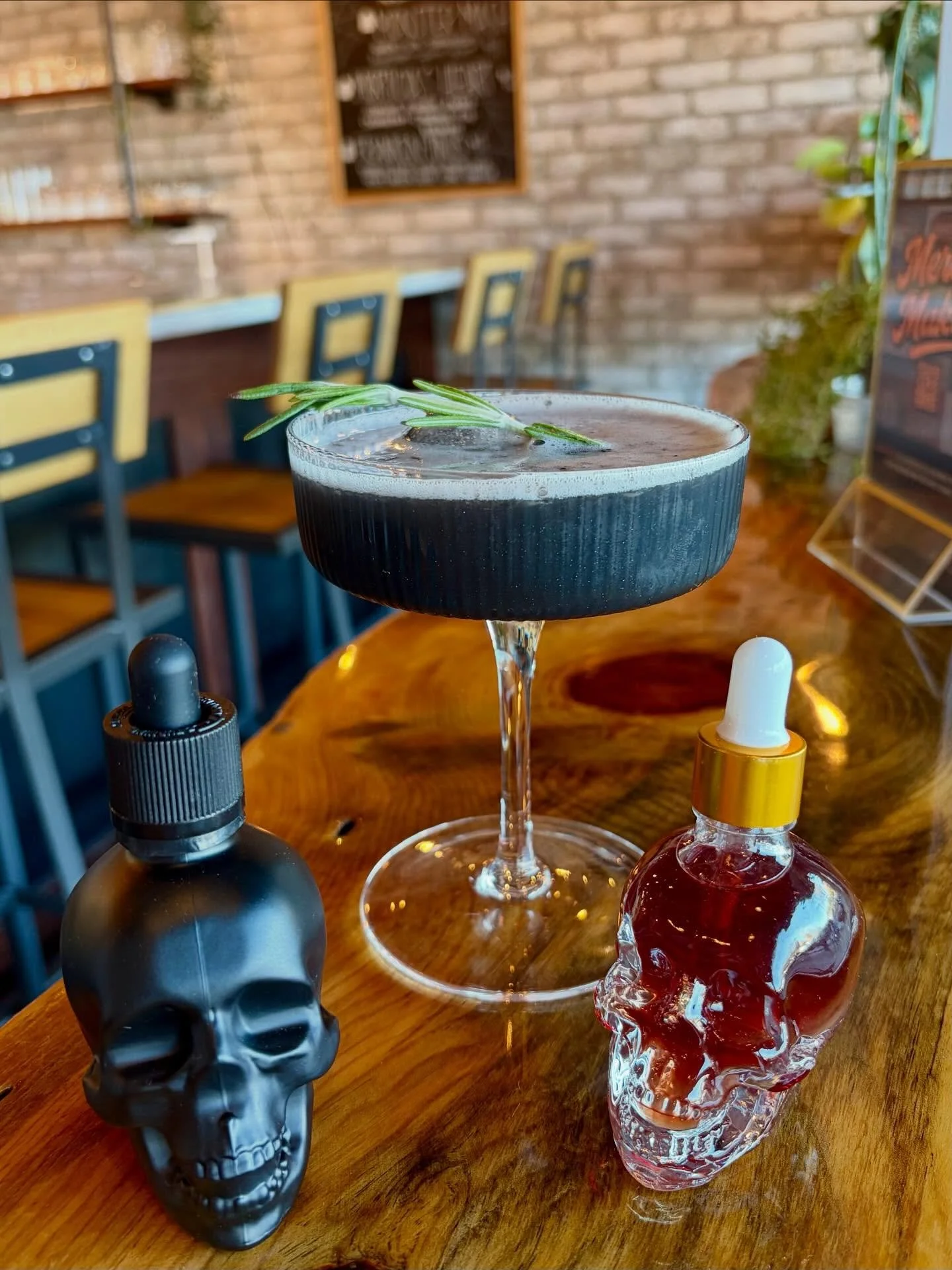 ⚠️Dark spirits only! Halloween cocktails are back and hauntingly good💀 
📸: Morticia’s Black Heart - Straight Bourbon Whiskey, Amaro Liqueur, cranberry, cinnamon, fig, rosemary 
#elevation5003distillery #elevatingspiritslocally #craftcocktai