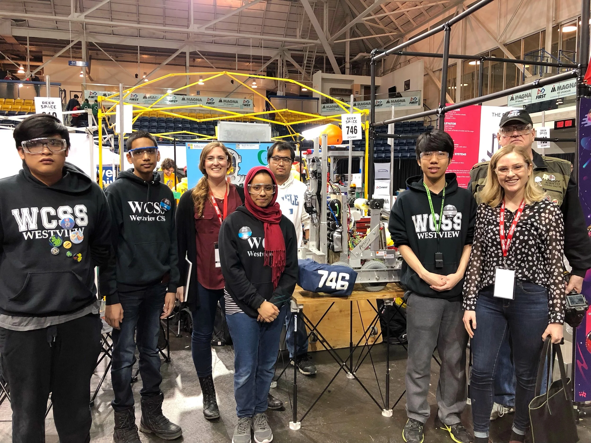 Standing in the pit with Team 746. Ibty, the team's operator, is pictured fourth from the left
