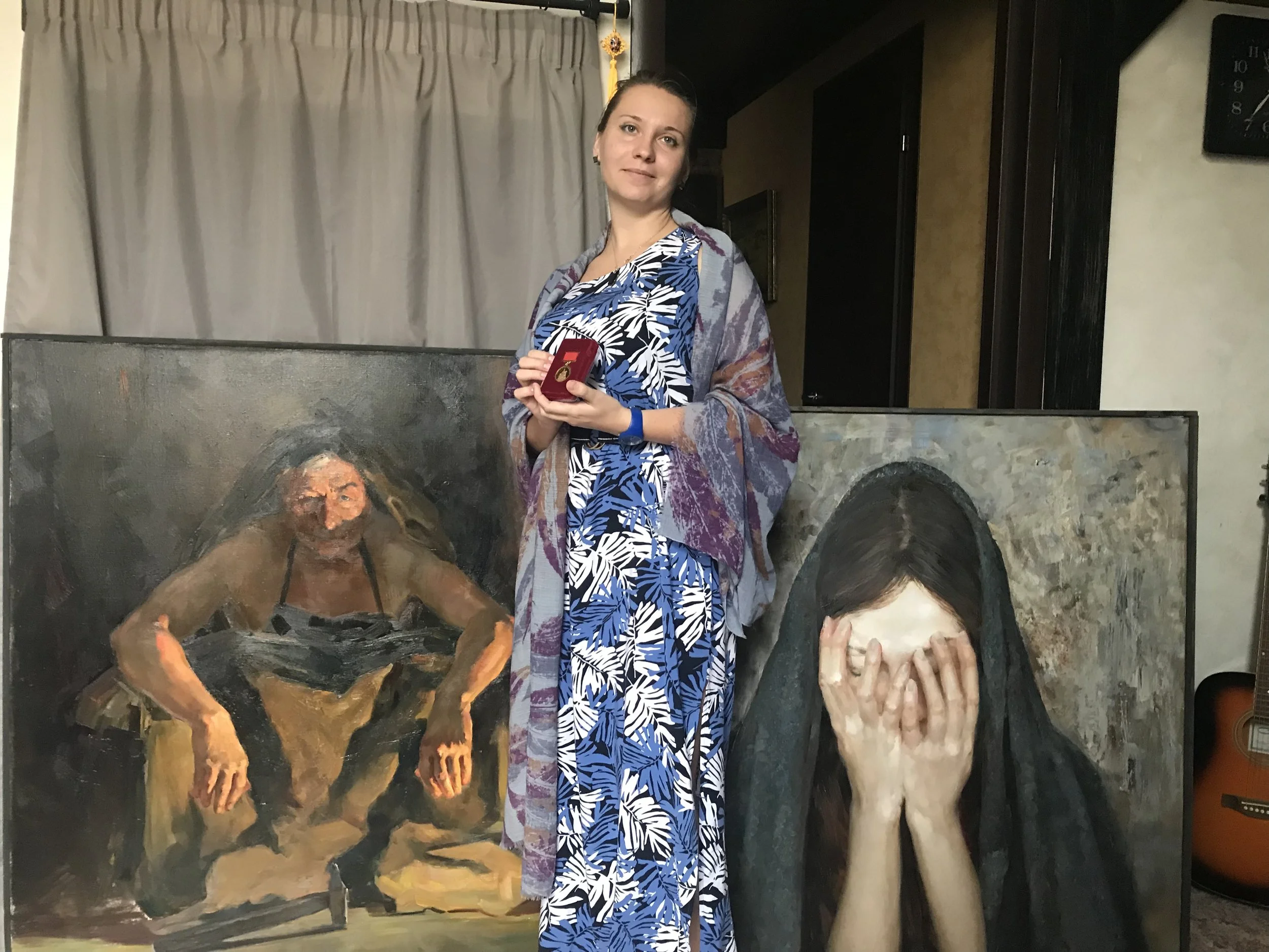 Sasha with her gold medal for this year’s work.