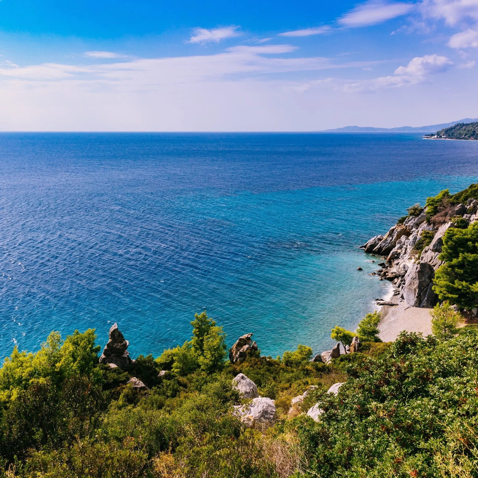 beautiful-landscape-of-turquoise-sea-and-rocky-PZ6WGX3.jpg