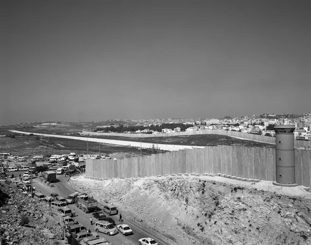 View towards Ramallah, Qualandia checkpoint in the foreground