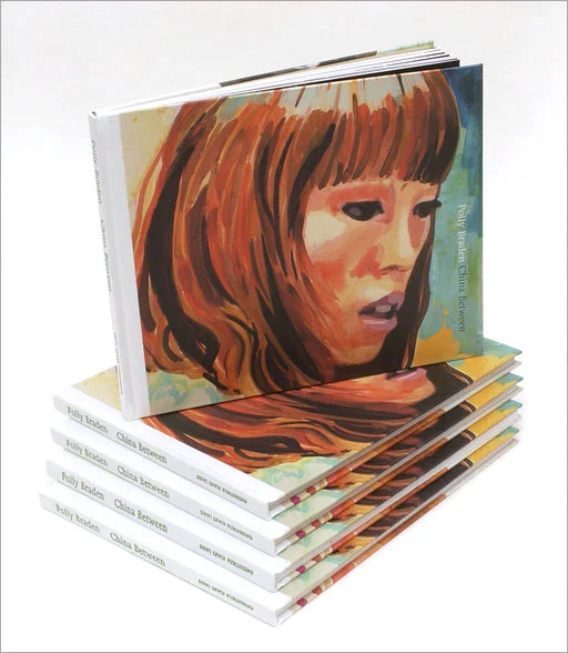 China-Between-stack-of-books.jpg
