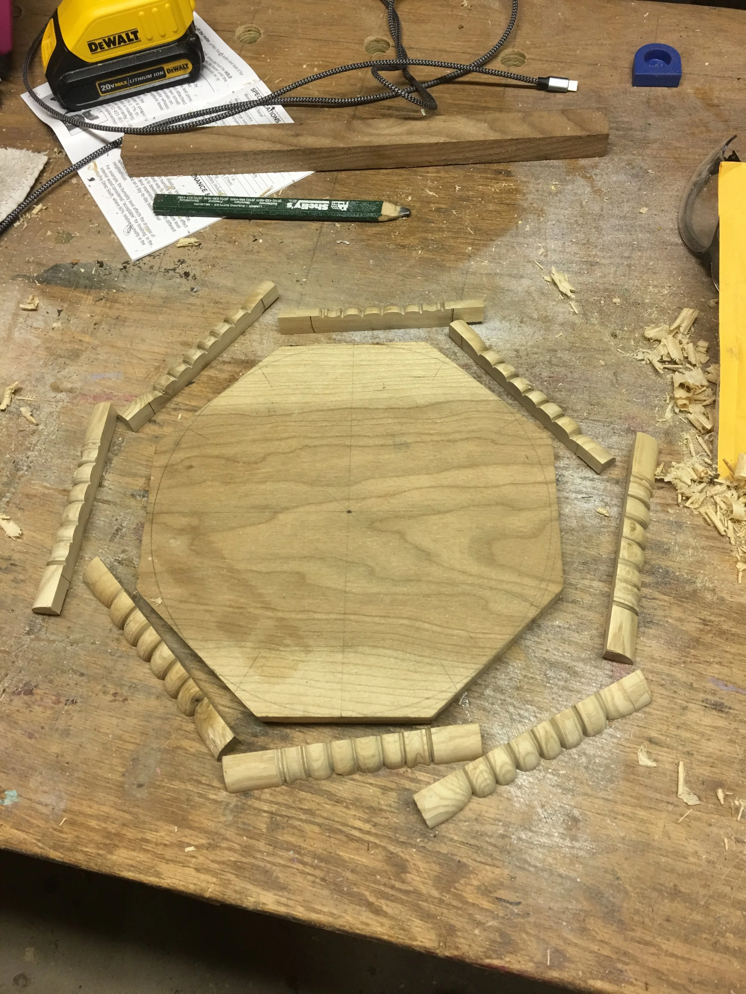 The octagonal clock with the quarters of the turn branch.