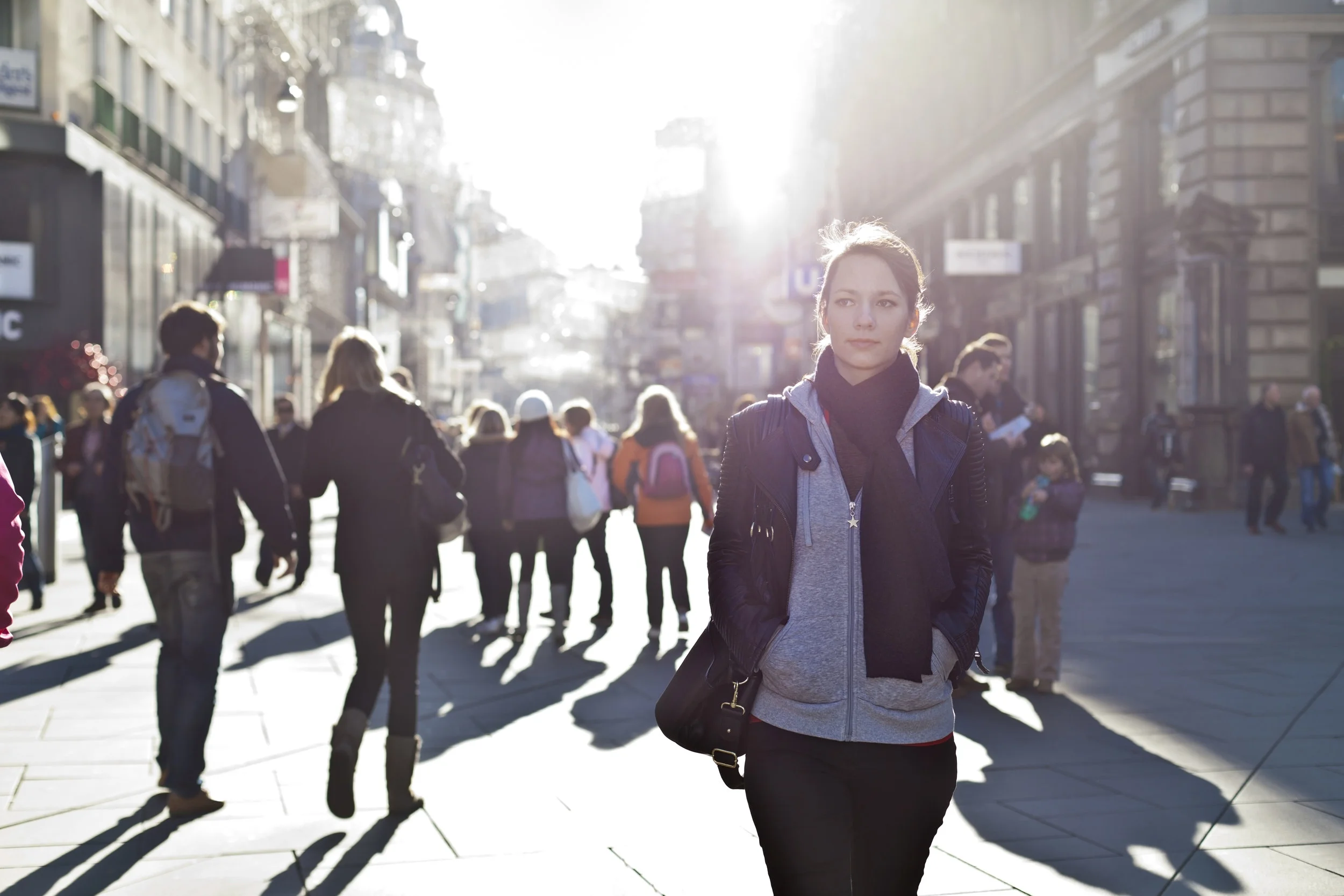 woman standing out from crowd.jpg