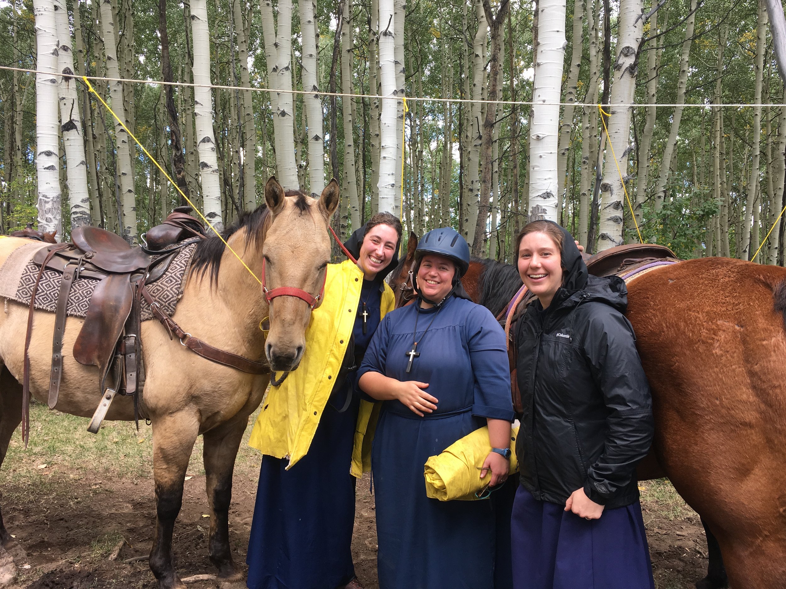 sisters with horses.JPG