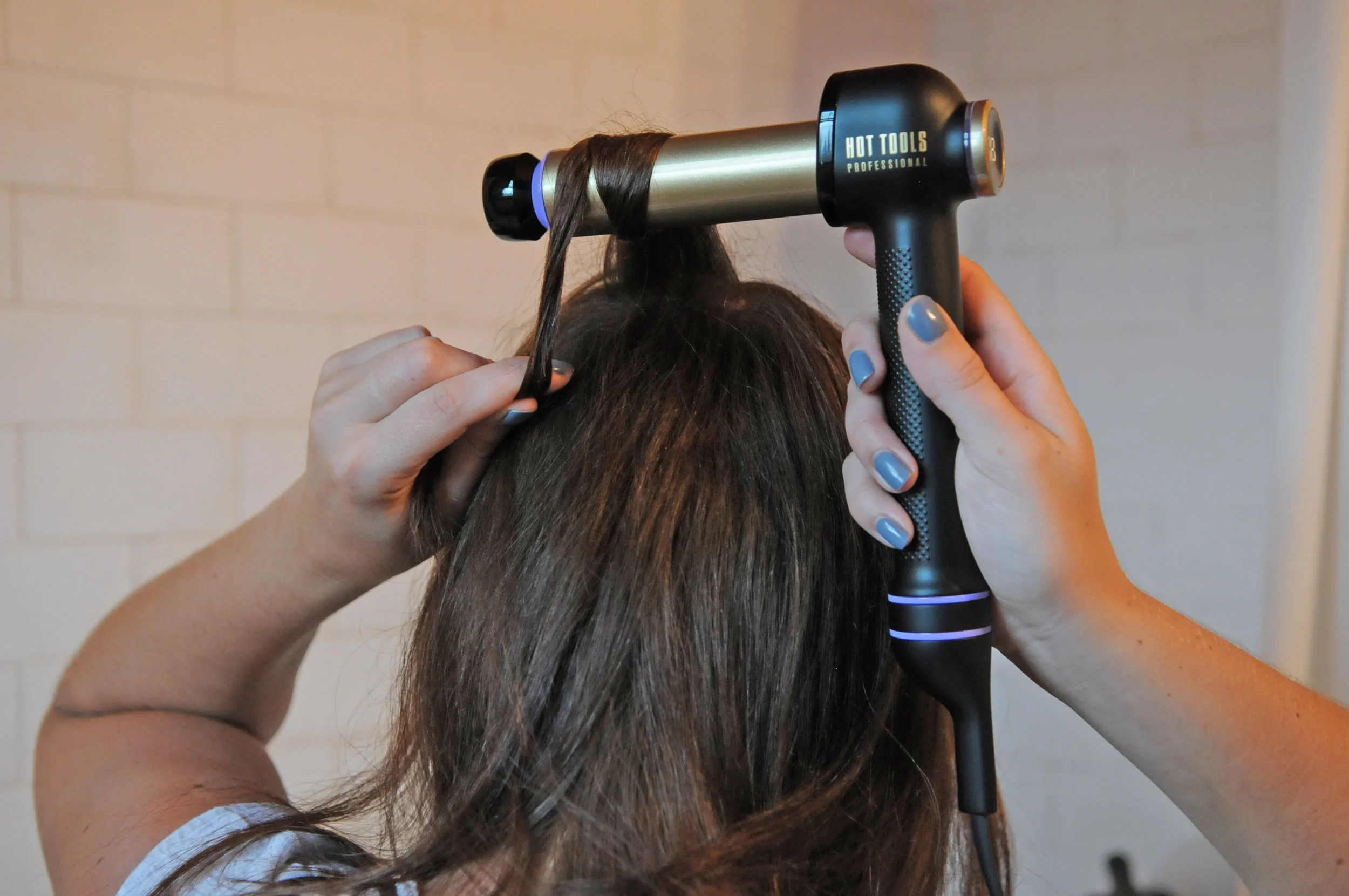 Home_ER_BackOfHeadReach.jpg