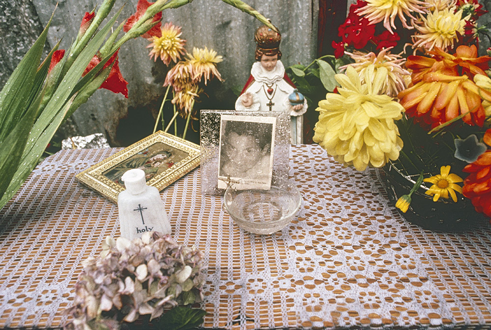 Altar for Seamus Duffy, he was shot dead by the Royal Ulster Constabulary following rioting in the New Lodge area of Belfast on 9 August 1989. A pathologist said his heart had been crushed by the impact of the plastic bullet which hit his chest.