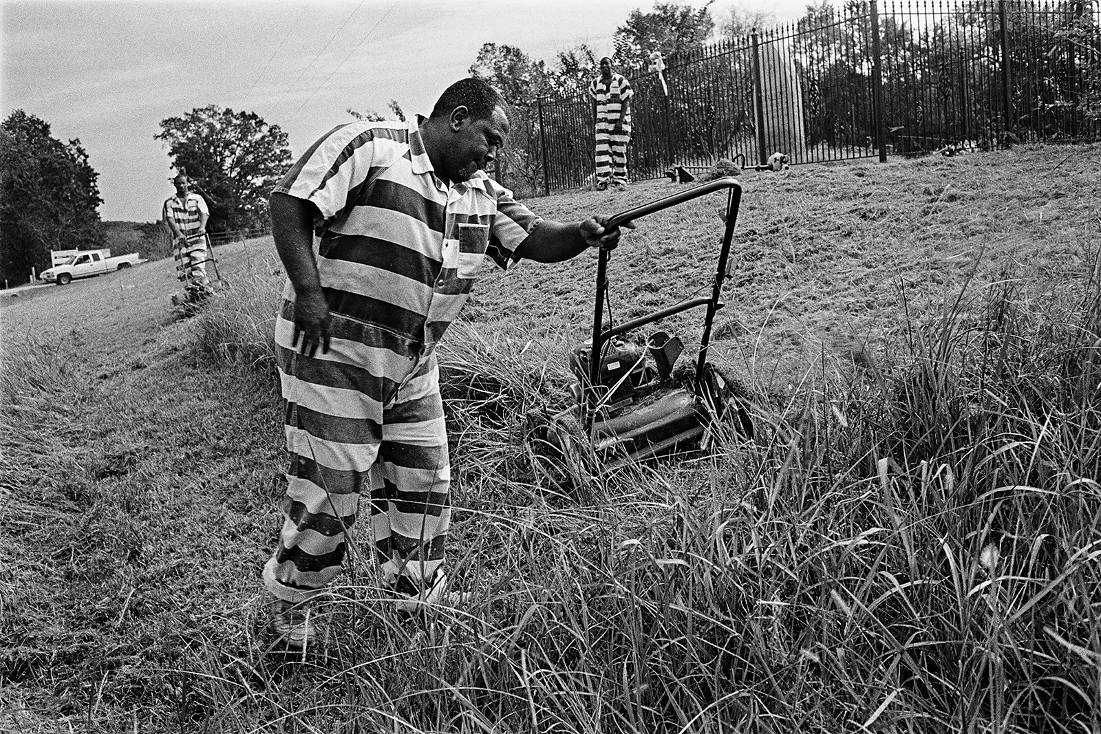Convicts Mowing around the Viola Liuzzo Memorial Marker, between Selma and Montgomery, Alabama, 2009