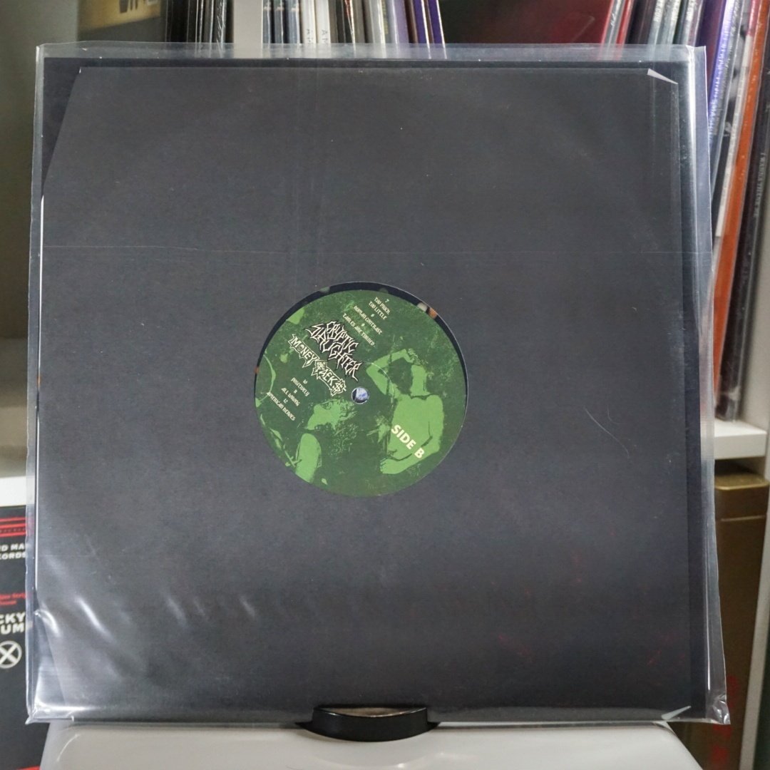 Cryptic Slaughter - Money Talks (Black Ice w/ Olive Green, Bone White and Halloween Orange Splatter Standard Gram) Reissue