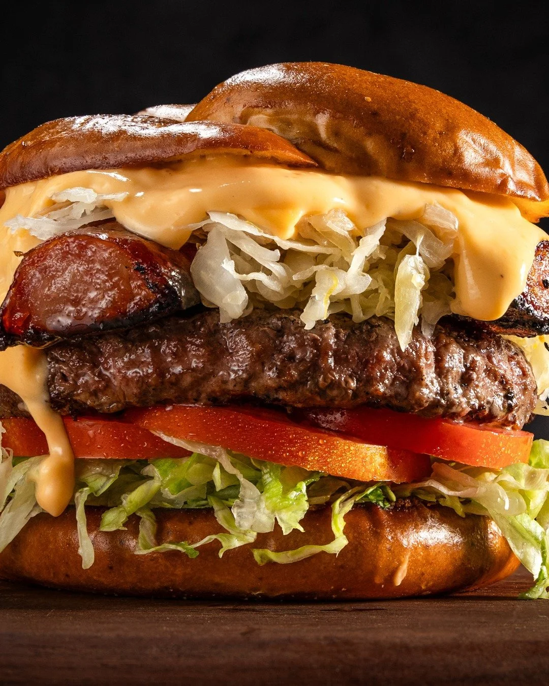 🍺🥨 Burger of the Month: Beer Cheese Bavarian Burger!🥨🍺

This beast is stacked with smoked sausage, griddled sauerkraut, beer cheese, lettuce, and tomato&hellip; all on a soft pretzel bun. 

💚 ✨ Two Timin&rsquo; Tuesdays ✨ ➡️ 2-for-1 Burgers ever