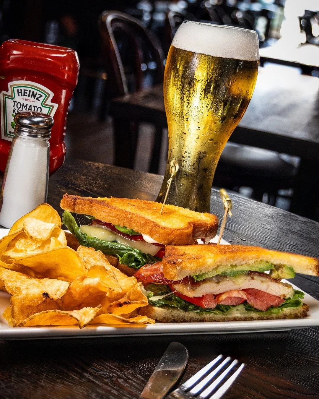 Grilled Chicken Club at Hennessey's!

Enjoy perfectly grilled chicken topped with applewood smoked bacon, fresh lettuce, tomato, mayonnaise, avocado, and Swiss cheese, all served on toasted sourdough bread. 

Come by and treat yourself to this flavor