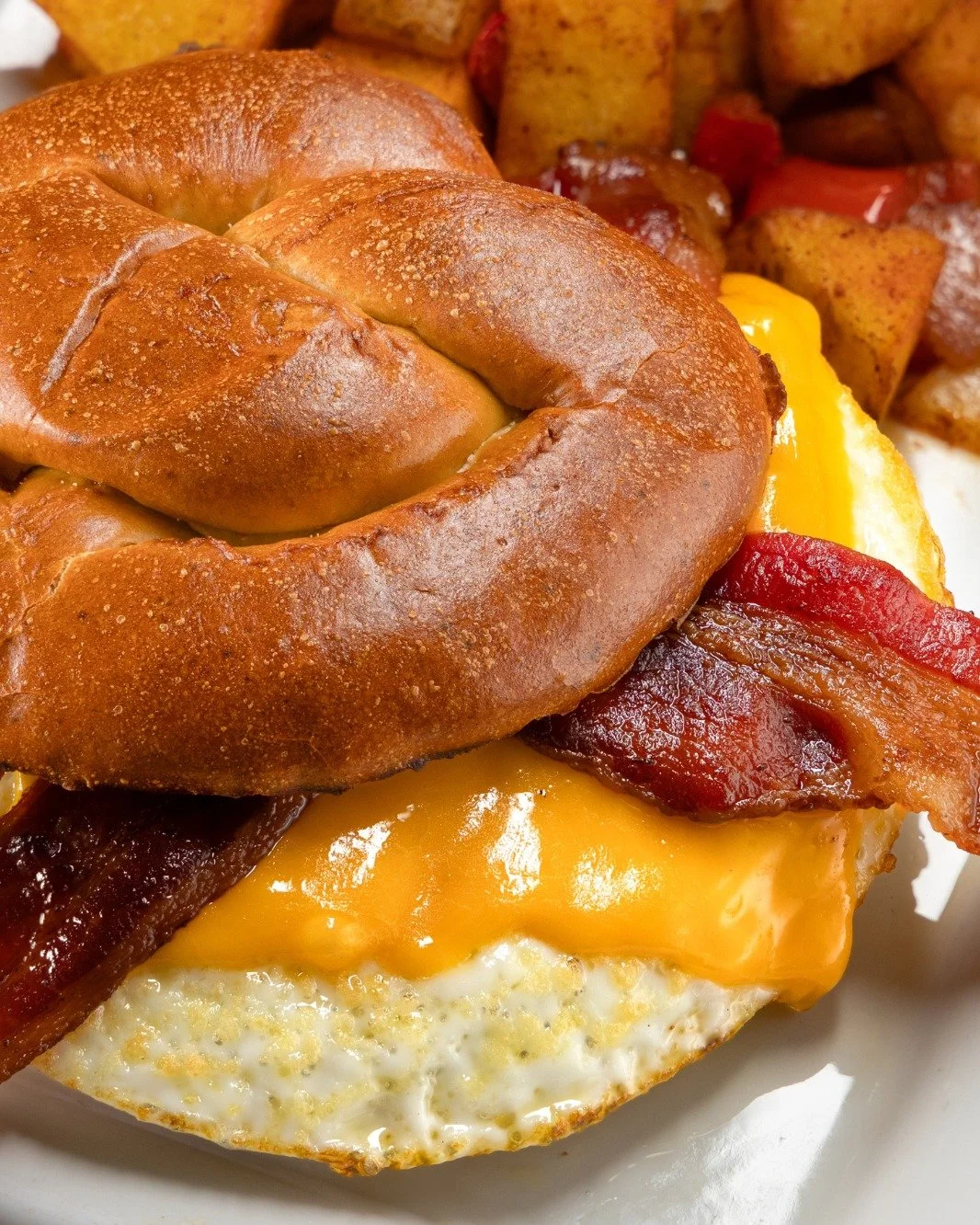 🥓🍳 Hennessey&rsquo;s Breakfast Sandwich 🥨

Two fried eggs, crispy bacon, and melted cheddar on a soft pretzel roll &mdash; served with breakfast potatoes. This one doesn&rsquo;t mess around.

Don&rsquo;t miss out on our ✨ Two Timin&rsquo; Tuesdays