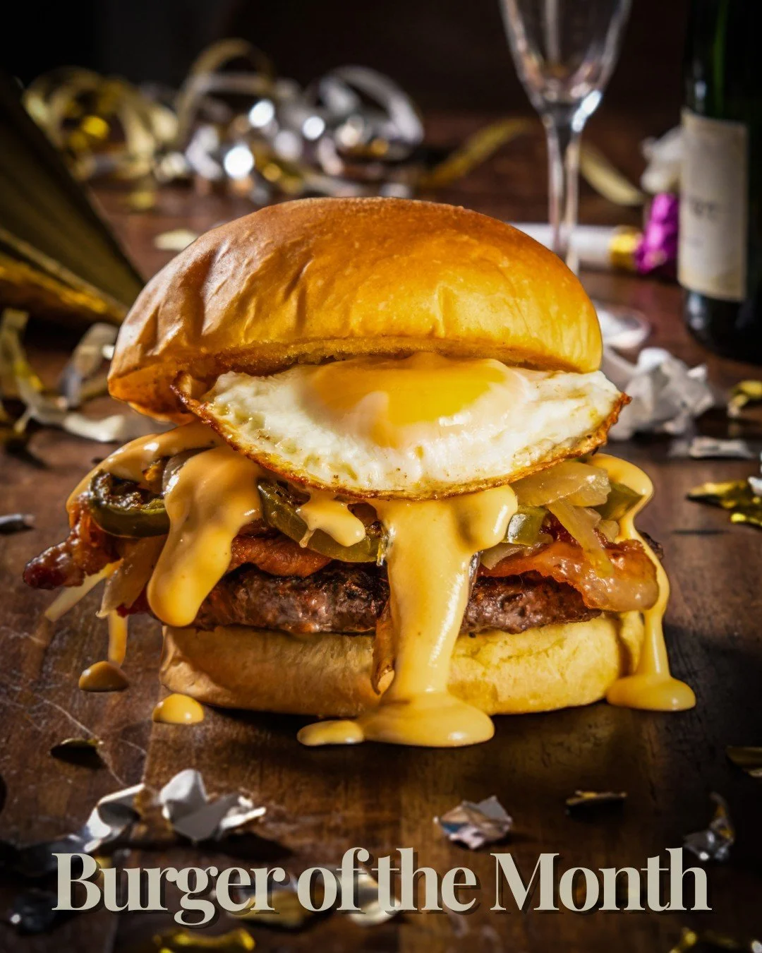 🍔🎉 Burger of the Month: The Hangover Burger! 
 
A juicy grilled burger patty, crispy bacon, jalape&ntilde;os, grilled onions, gooey beer cheese, and a fried egg to cure even the toughest of hangovers. 
 
Don&rsquo;t forget about our ✨Two Timin&rsqu