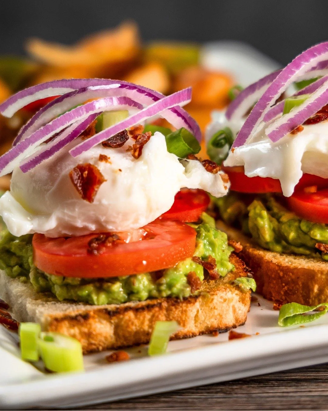 🥑🍞 Avocado Toast at Hennessey&rsquo;s! 

Sourdough bread topped with smashed avocado, sliced tomato, crispy bacon, 2 poached eggs, pickled onions, and everything seasoning&mdash;served with breakfast potatoes.

Don&rsquo;t miss out on our ✨ Two Tim