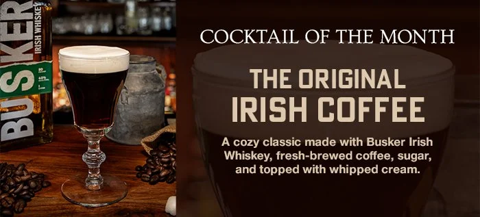 The Original Irish Coffee cocktail of the month with Busker Irish Whiskey, fresh coffee, and whipped cream on a bar.