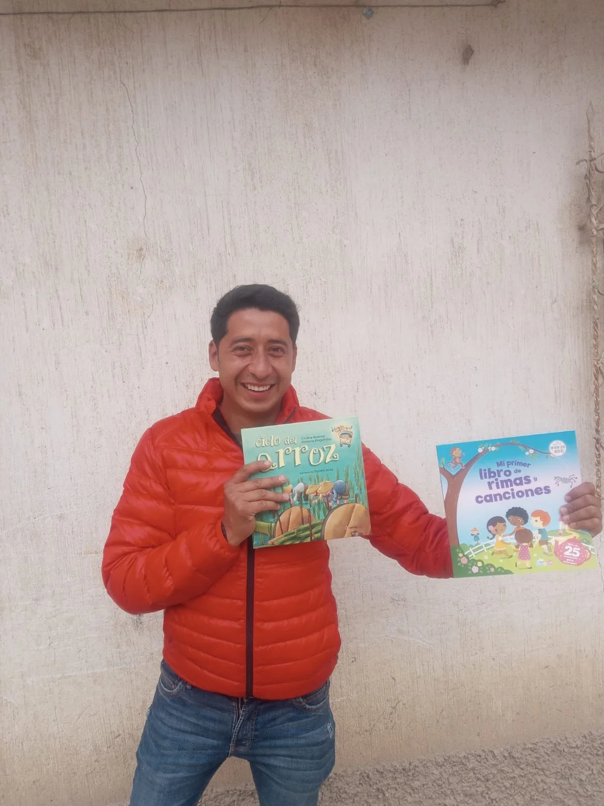 Teacher fellow w books.JPG