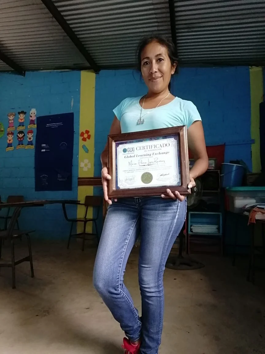 Maria Lopez hoding her certificate.JPG