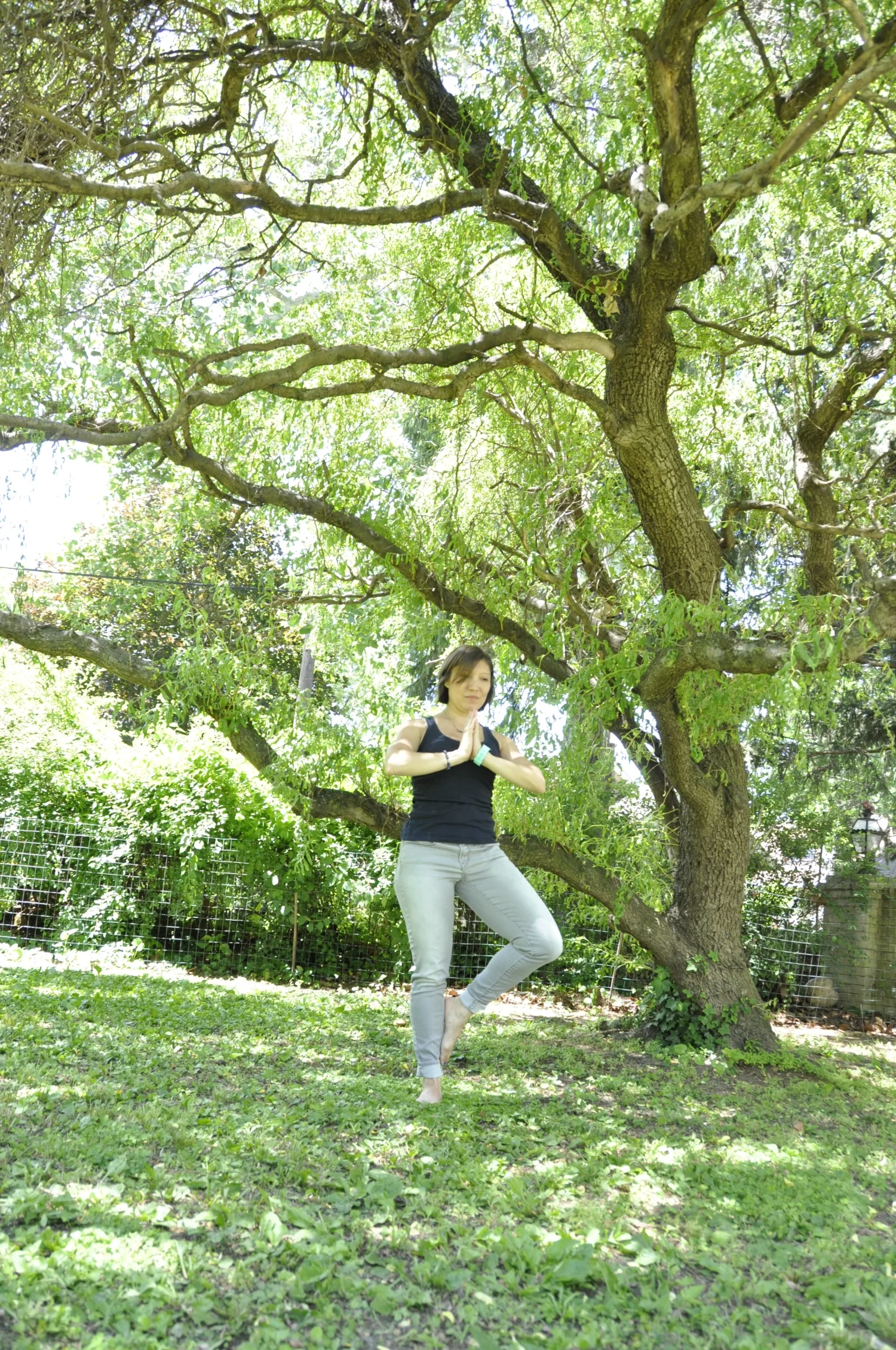 Sometimes my left knee hurts in tree pose (Vrksasana) because I don’t have full flexion there. So I frequently now opt to keep my leg lower instead of forcing myself into it. Photo credit: Aly Gaul .