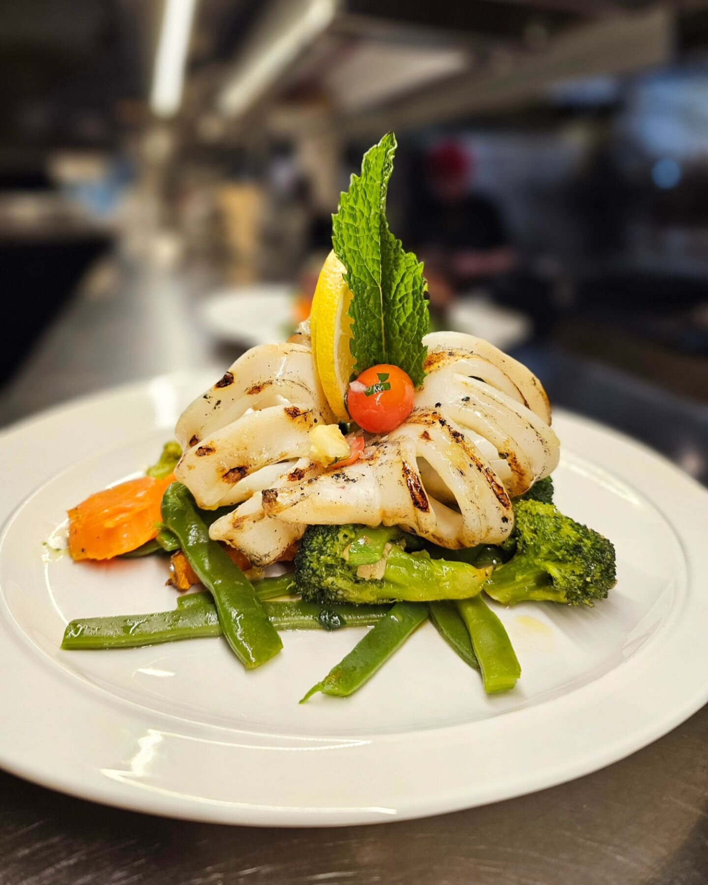 Grilled Squid at Piri Piri Restaurant, Toronto.

#restaurant #food #foodie #torontorestaurants #cravethe6ix #torontojunction #seafood #mediterraneancuisine #toronto #canada.