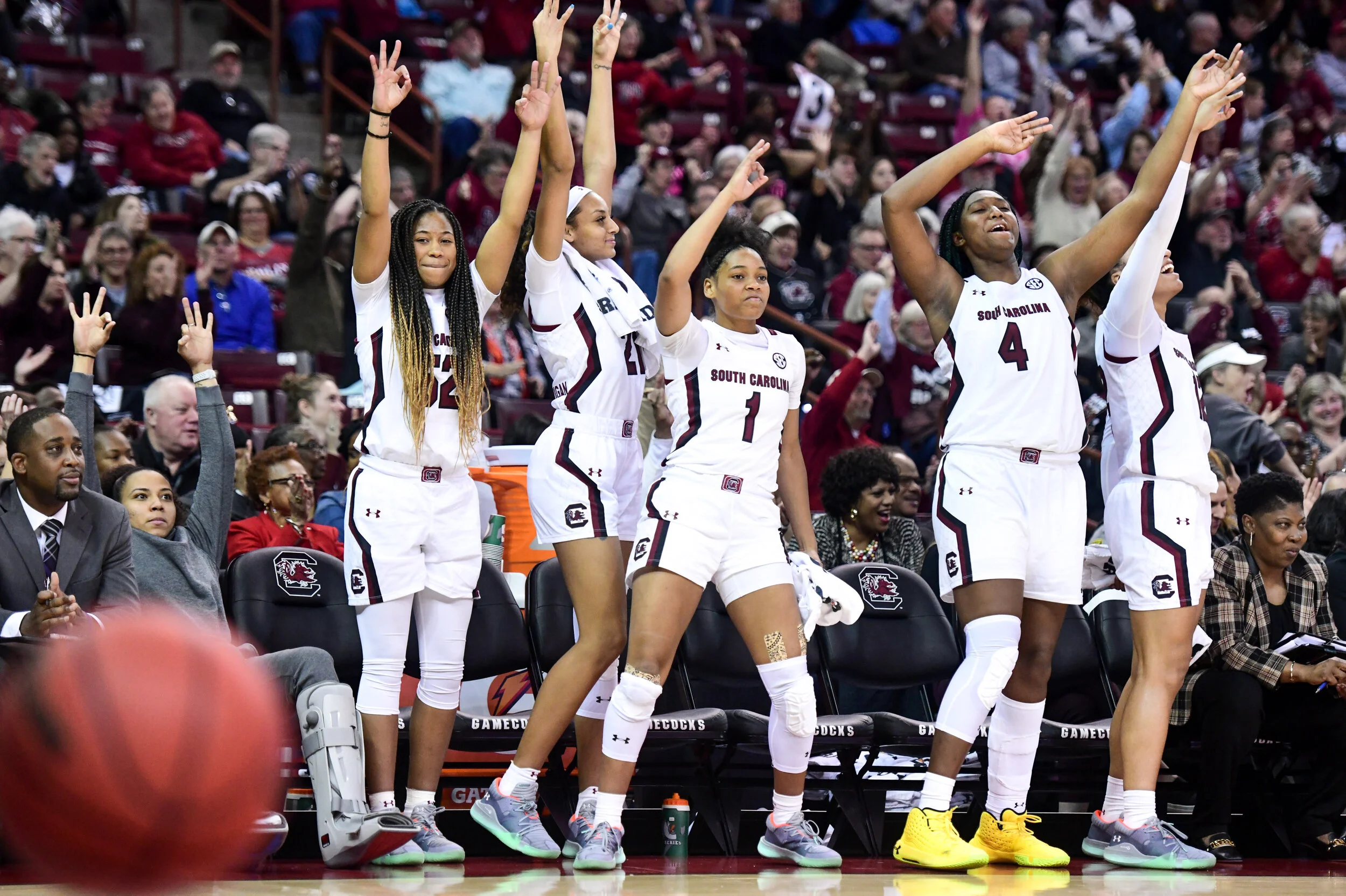 South Carolina guard Zia Cooke (1), Tyasha Harris, left, Mikiah Herbert Harrigan (21), and Aliyah Boston (4) celebrate a three-point basket Thursday night against Duke. (AP Photo/Sean Rayford)