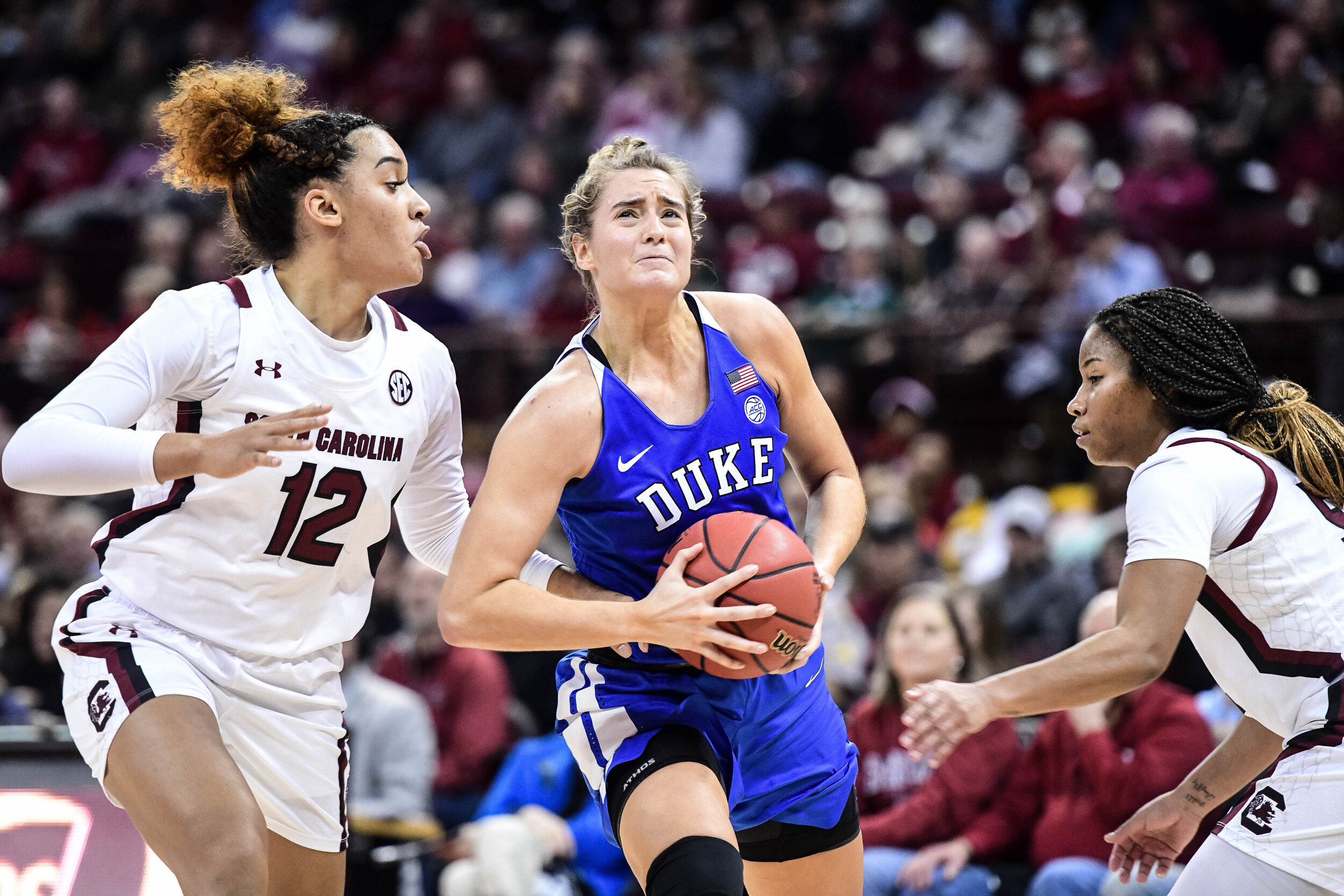 A Duke Player drives to the hoop agiast South Carolina