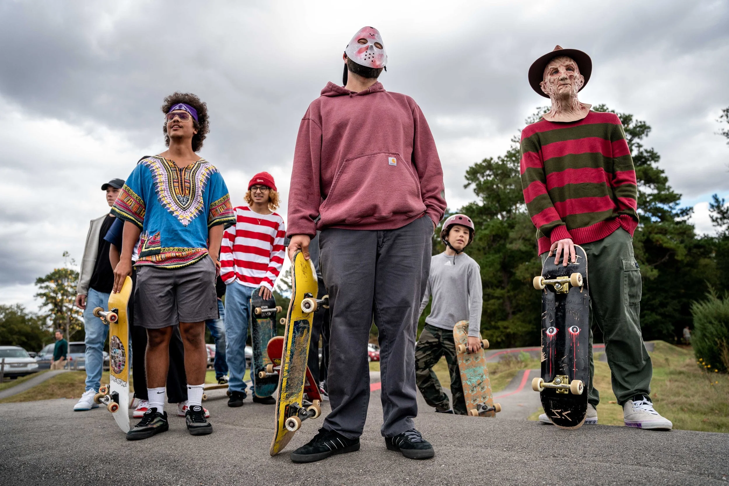 Skateboarders in costumes hold boards Pumptrack Death Race - Halloween Columbia SC
