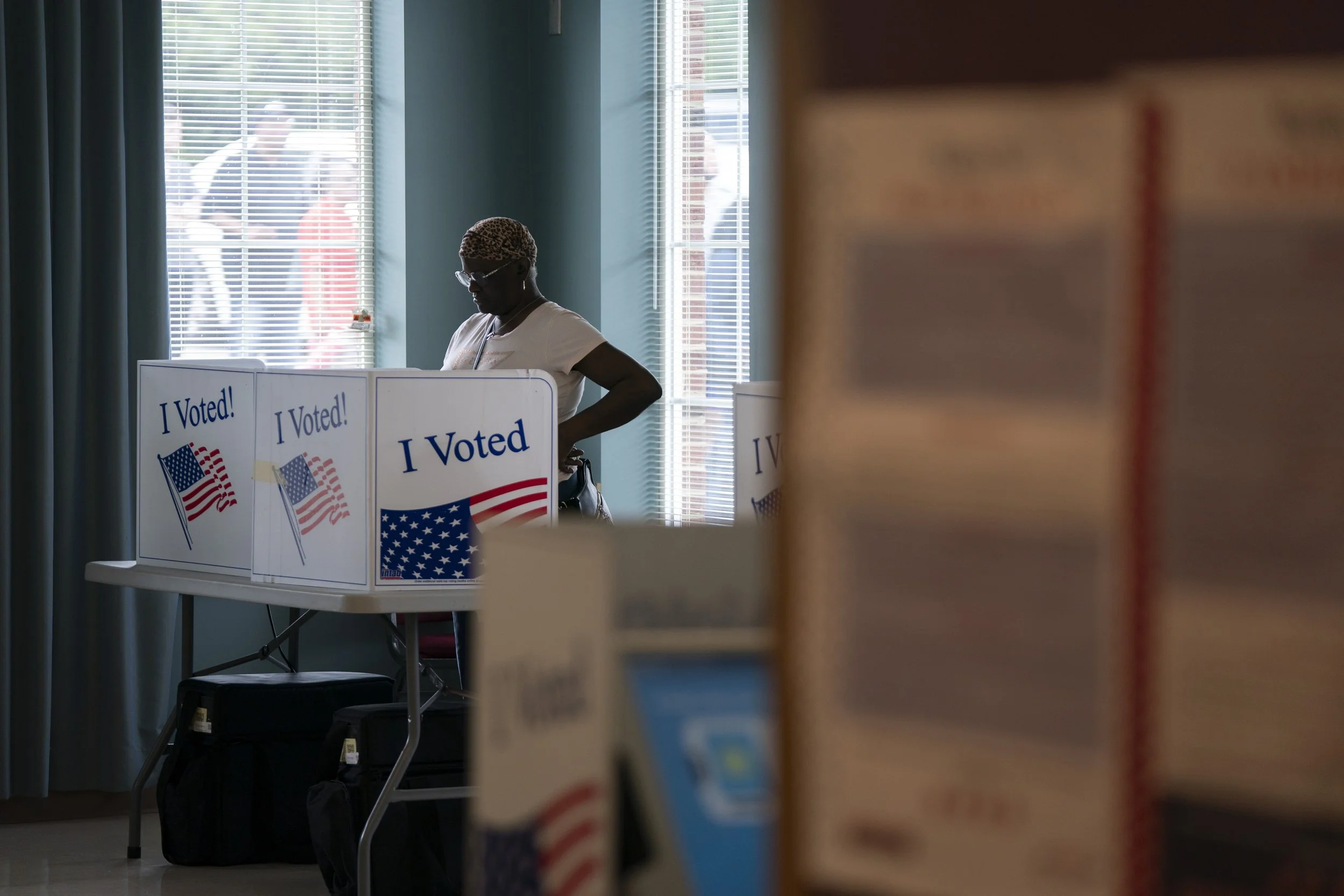 A voter casts a ballot in Hopkins