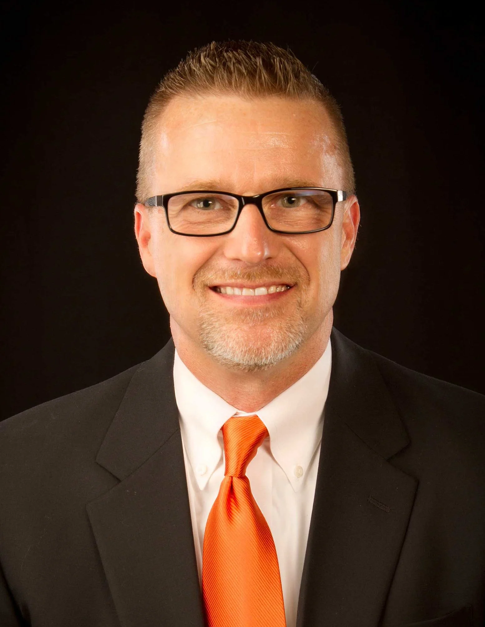 Standridge-Headshot-e1526403670750.jpg