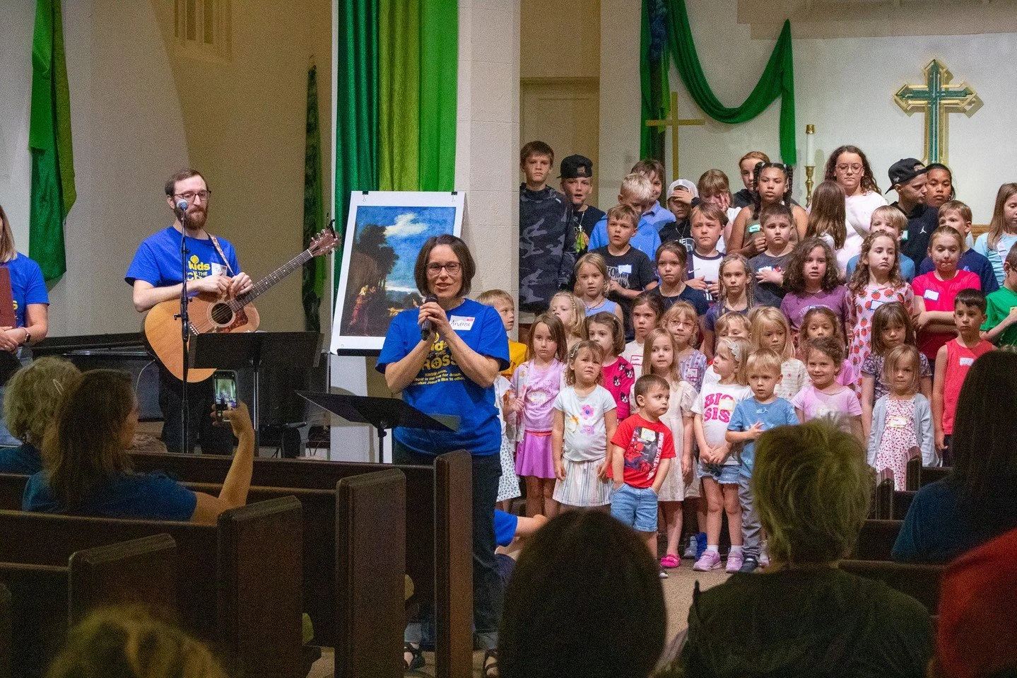 VBS Part 2/3: Parents, grandparents, and guardians are invited to join us on the last day for a time of worship together. By this time, the kids are excited to share their memory verse, new songs, artwork, and reflections from our time together. The 