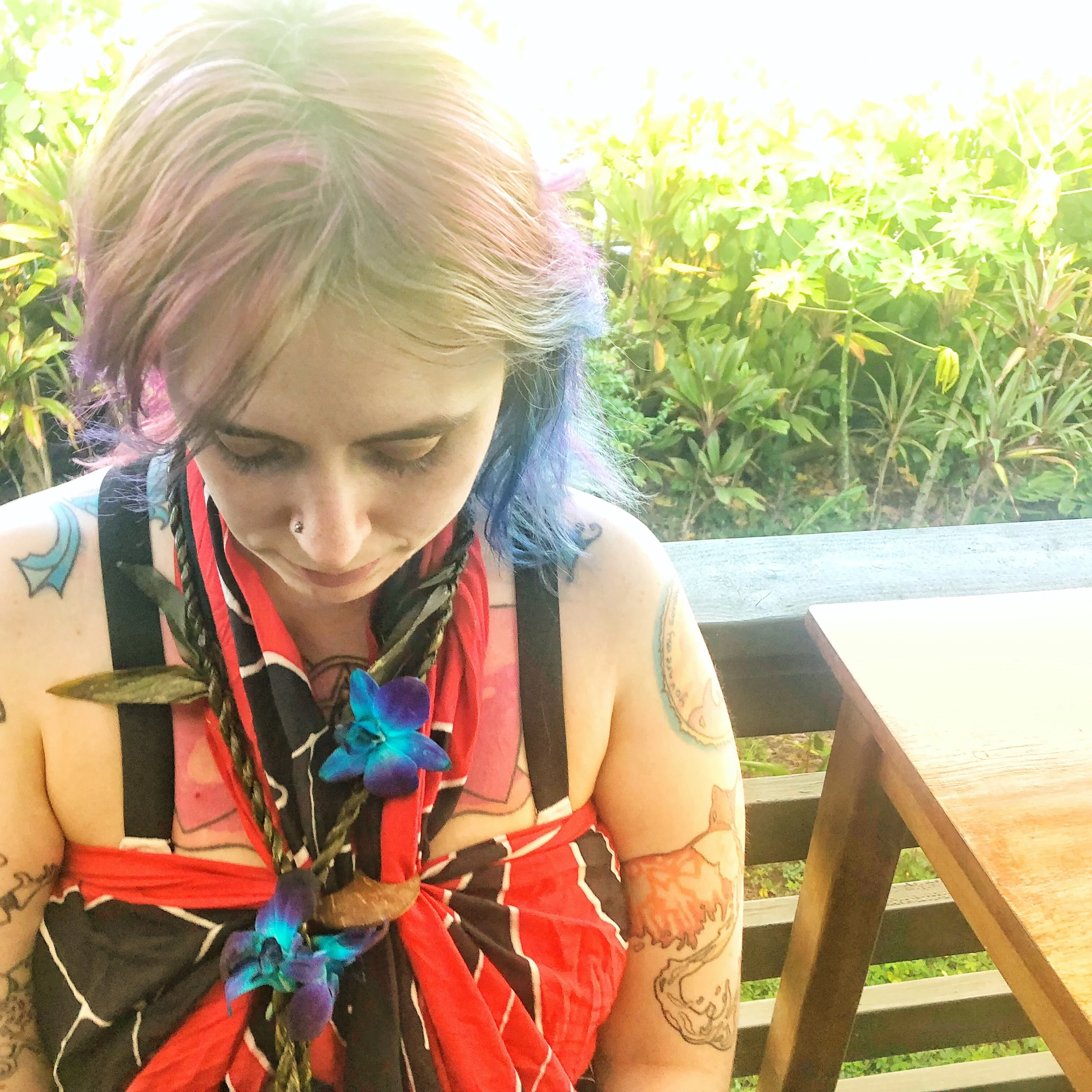 Tay’s new sarong and orchid lei 🌊