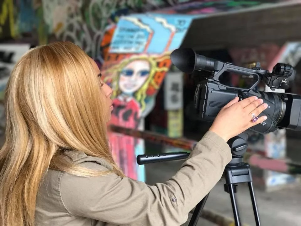  Alahna filming the first episode of her show Georgia Detours on Krog Street market. The episode is all about Atlanta’s thriving art scene. 