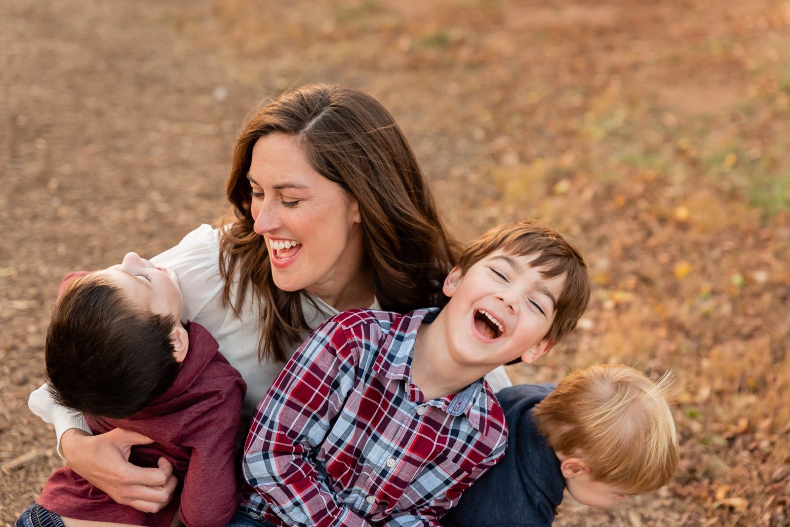 mom snuggling sons  St. Louis Family Photography sarahrowlandphotography.com