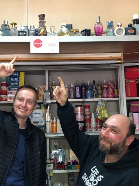    Mousa Fares (on the right), beneficiary of an ACN-funded microproject with which he opened a perfume shop and Miroslav Dzurech (on the left), director of ACN Slovakia.   